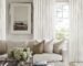 Pinch pleat curtains in an elegant living room with full-length tailored drapery